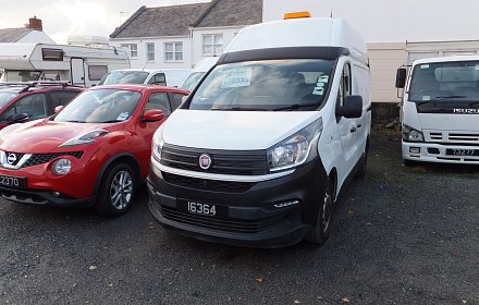 Awaiting preparation. High top Talento van. Has a towbar